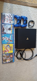 Play station 4 pro 1 tera with 5 game